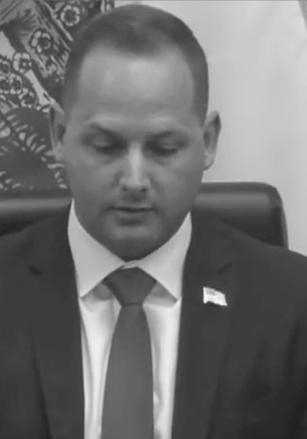 Councilmember Ryan Cotton at a City Council meeting